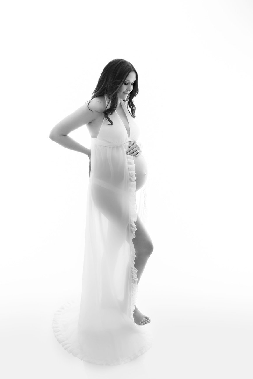 Vancouver Maternity Photographer Pregnant woman in white sheer dress