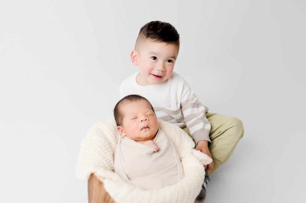 Vancouver Newborn Photography sibling big brother with newborn brother