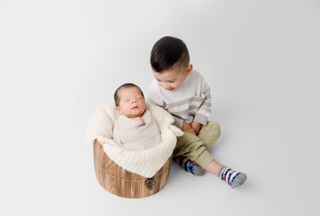 Vancouver Newborn Photography sibling big brother with newborn brother