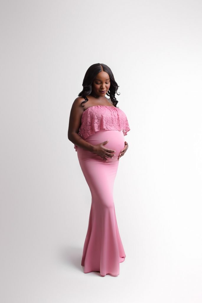North Vancouver Maternity Photographer Burnaby - pregnant woman in pink dress