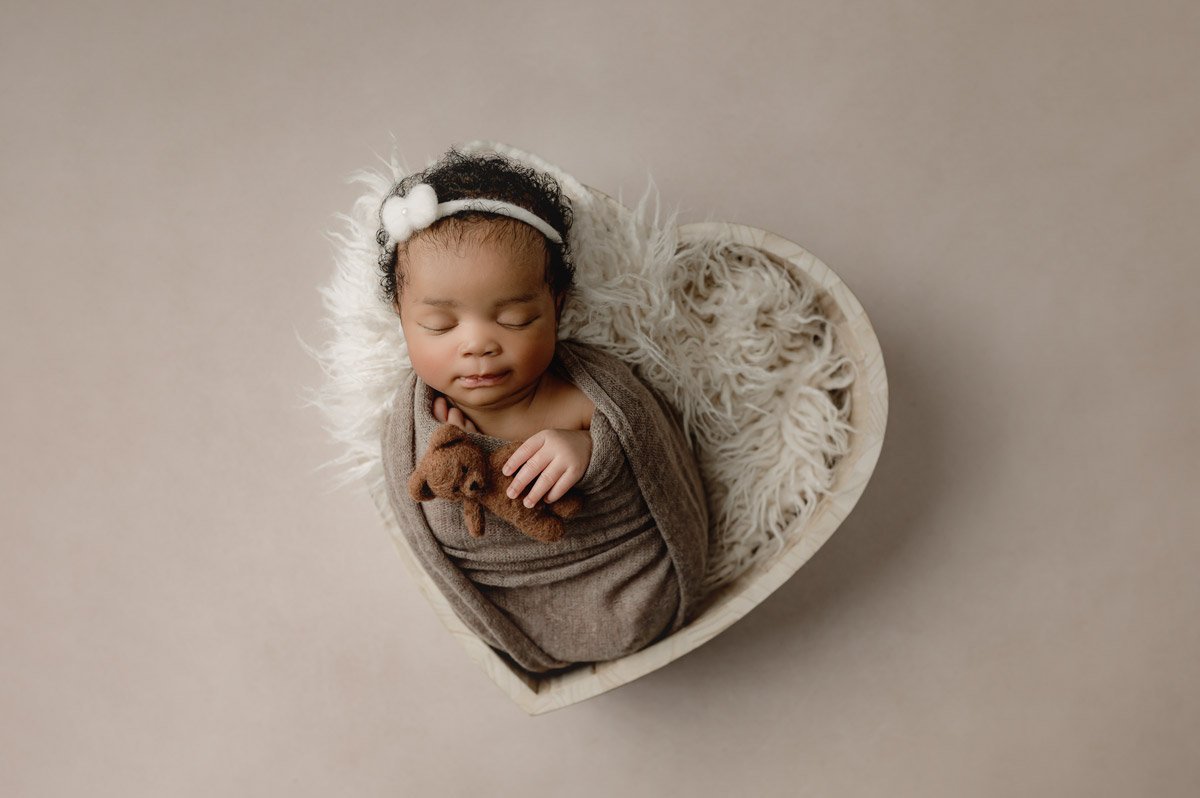 Newborn Photography Vancouver baby girl in a heart bowl