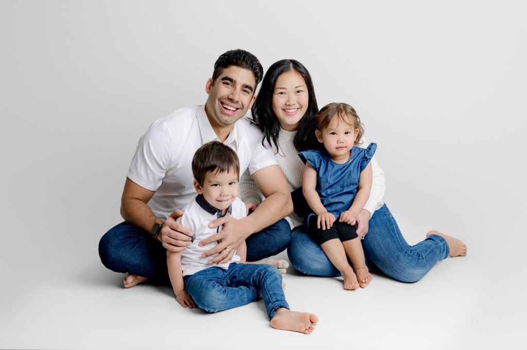 Image Of a Family Sitting On The Floor